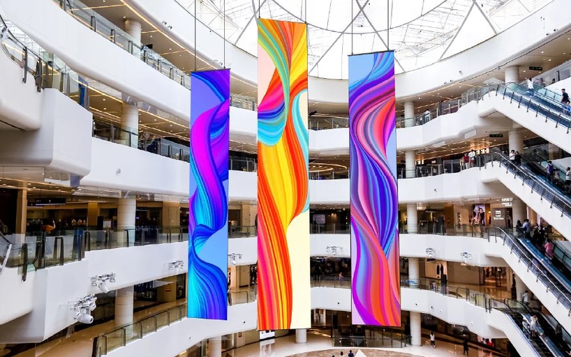 Suspended LED displays in a shopping and business atrium.