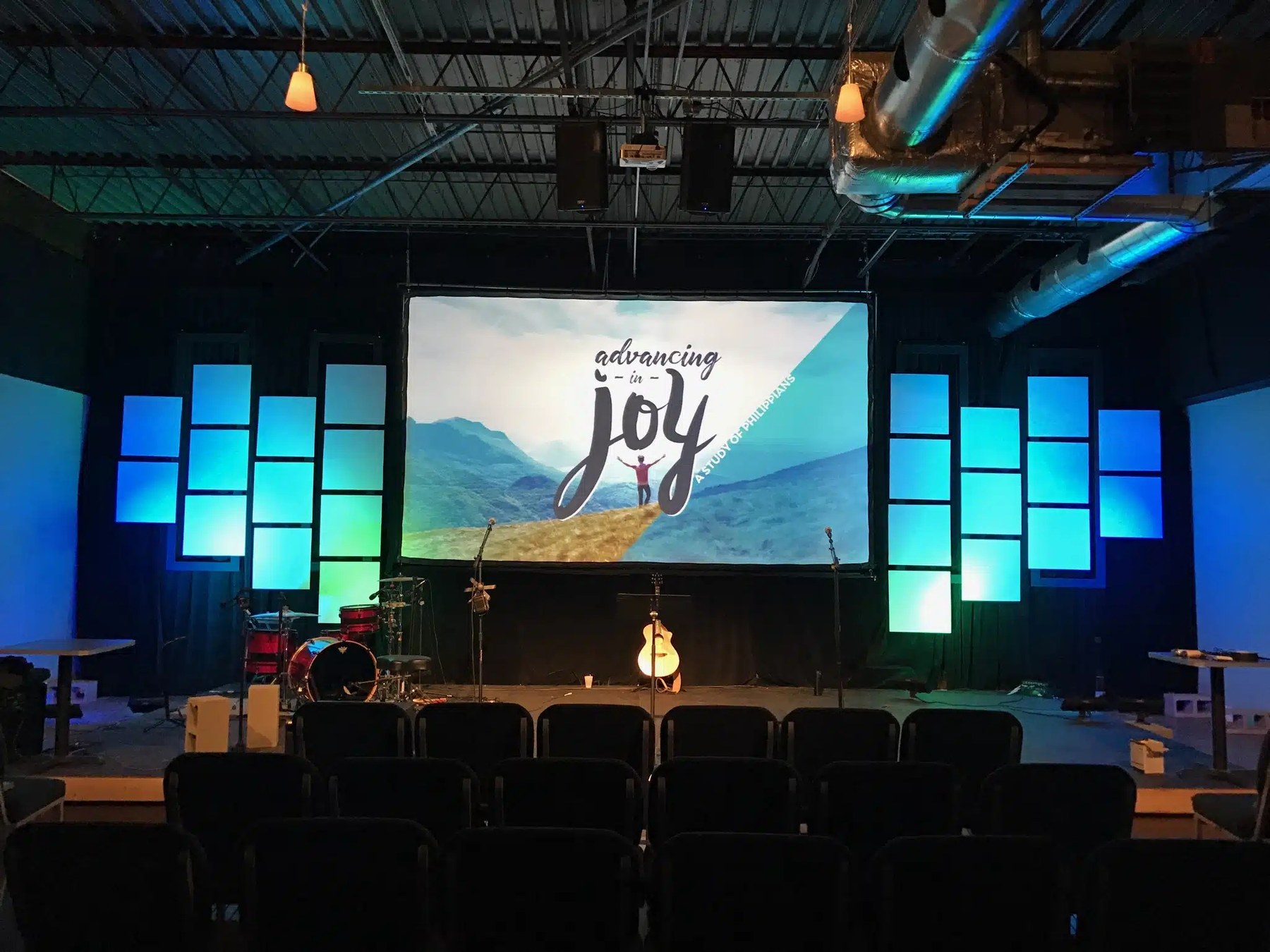 Stage backdrop screen in a worship space.