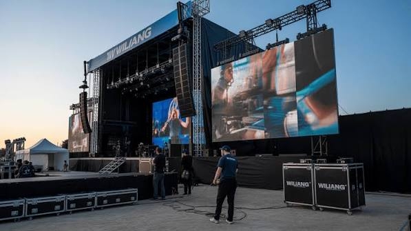 Outdoor rental cabinets configured for a festival main stage.